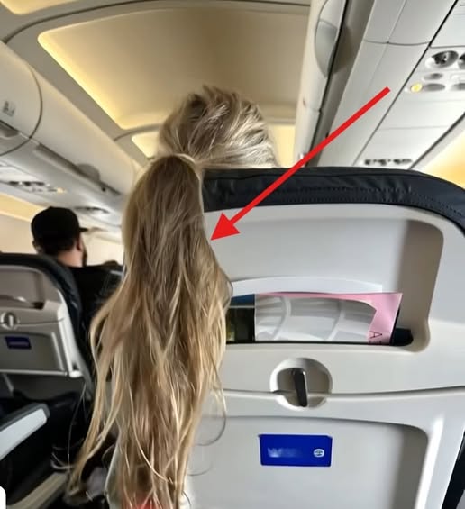 A girl on the plane threw her hair over my seat, blocking my screen: I had to teach the rude woman a lesson