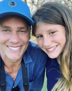 Tom Brady didn’t sign autographs or toss footballs—he picked up a soaked, shivering dog in the Texas flood and quietly said, “I’ll take him home.” What broke the internet was the text he sent his daughter: “I can’t bring you everything you ask for, but this dog needs a home—and I think you’d say yes.” No fanfare, no headlines, just a dad, a dog, and a gesture of kindness that drowned half the internet in tears.
