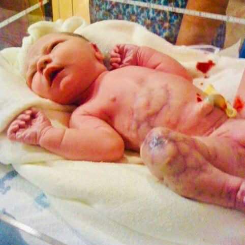 Mom delivers baby, forbidden from holding him when dad utters: