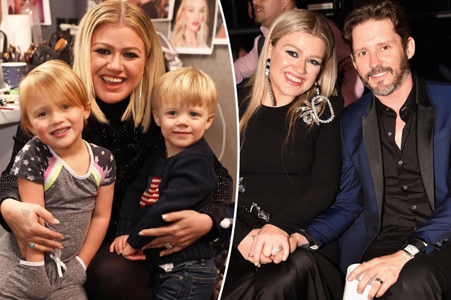 Just ten minutes ago, heartbreak unfolded in the cold Texas morning. Under gray skies and biting wind, Kelly Clarkson stood at Brandon Blackstock’s funeral, her voice trembling through “I Will Always Love You.” Midway through the song, the weight of grief shattered her composure, and tears streamed down her face. Blake Shelton stepped in, wrapping her in a tight, tearful embrace, holding her up when her knees nearly gave way. Beside them, Michael Bublé stood silent, his head bowed in quiet respect. At the coffin, Reba McEntire knelt, her sobs breaking the still air as she whispered apologies to the stepson she had loved like her own. The wind seemed to carry their grief, the gray sky hanging heavy over a moment no one there will ever forget.