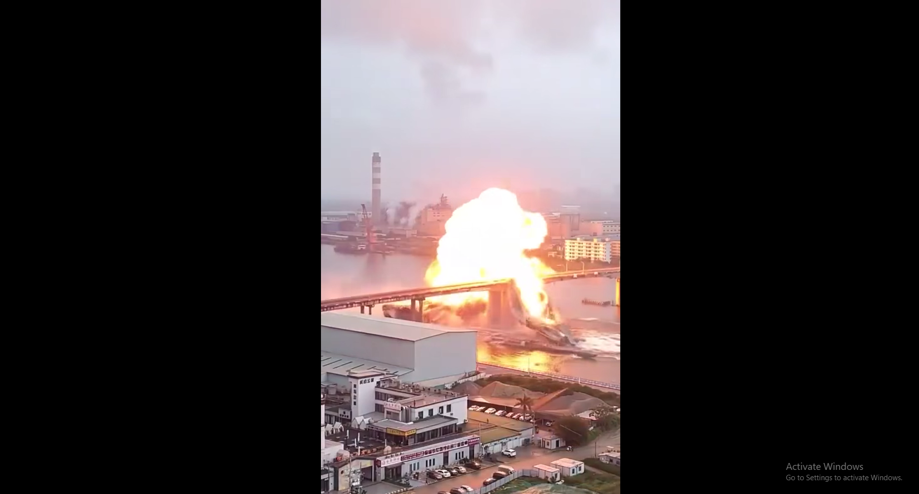 Moments from Disaster: Tanker Caught Under a Crumbling Bridge