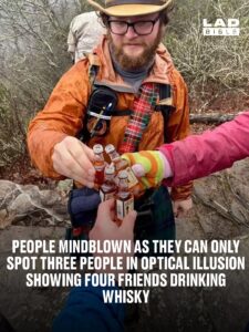People mindblown as they can only spot three people in optical illusion showing four friends drinking whisky