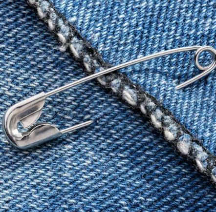 What’s the Purpose of That Tiny Hole in a Safety Pin?