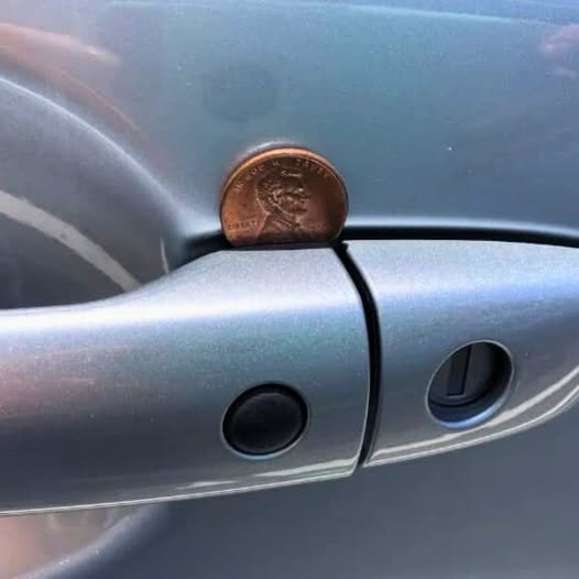 If You Ever Notice a Penny in Your Car Door Handle What It Could Signal and Why Staying Alert Matters