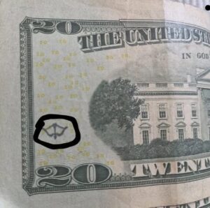 The Hidden Meaning Behind the Bow And Arrow Marks Found On Some Dollar Bills