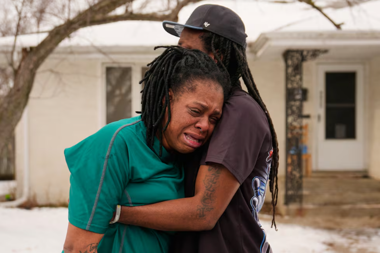 WHEN DOORS ARE BROKEN AND A CITY HOLDS ITS BREATH.