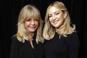 Goldie Hawn and Kurt Russell burst into tears as Kate Hudson began to sing