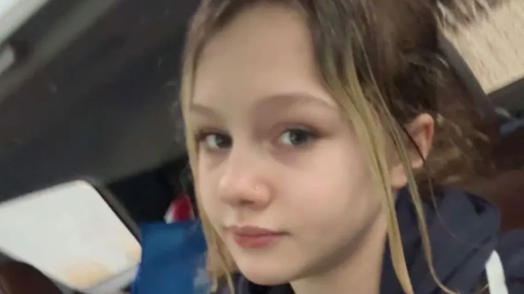 “SHE TRIED TO LOCK THE DOOR TO SAVE HER FRIENDS AND NOW SHE IS FIGHTING FOR HER LIFE” — 12-YEAR-OLD MAYA GEBALA FIGHTS FOR HER LIFE AFTER TUMBLER RIDGE SCHOOL SHOOTING A quiet morning in Tumbler Ridge turned into chaos when gunfire erupted inside a school library, leaving 12-year-old Maya Gebala critically wounded and now fighting for her life in a Vancouver hospital. Family members say Maya was shot in the head and neck as she tried to lock the library doors to protect her classmates, stepping into danger as others scrambled for safety. Authorities have identified the 18-year-old suspect as Jesse Van Rootselaar, alleging the violence began at a private home before moving to the school. Flashing police lights, terrified students, and stunned teachers transformed the small British Columbia community in a matter of minutes. Outside the hospital, candles flicker as classmates call Maya a hero and pray for a miracle. As doctors continue their fight to save her, the entire town waits for the next fragile update that could change everything. Full story in the comments.