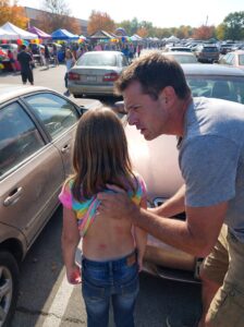 ” Dad, Can We Just Go Home? Please?” — At The School Carnival, My Daughter Tugged Gently At My Jacket With A Quiet, Uneasy Voice. When We Finally Reached The Truck, She Slowly Lifted Her Sweater, And What I Saw Made My Heart Stop For A Moment — Dark Marks Spread Across Her Side, Leaving Me Frozen In Silence.