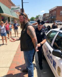 A Biker Was Handcuffed by Police in the Middle of the Street — Minutes Later the Same Officer Removed the Cuffs and Saluted Him