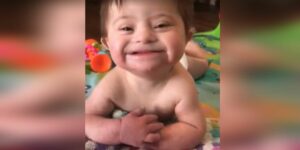 Adopted baby with Down syndrome goes viral after smiling for mom