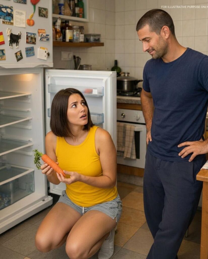 Ana was cleaning the refrigerator when, suddenly, her husband appeared in the kitchen doorway.