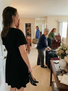 After my husband’s funeral, I returned home with my black dress still clinging to my skin. I opened the door… and found my mother-in-law and eight family members packing suitcases as if it were a hotel.
