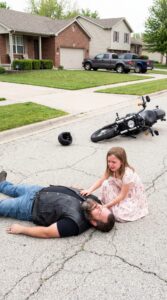 A Feared Biker Lay Injured and Alone on a Silent Road Believing No One Would Help Someone Like Him — Unaware That a Little Girl’s Courage to Stay Would Save His Life, Restore His Daughter, and Change Her Own Future Forever