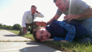 He Smiled And Said The Boy “Just Liked Dressing Warm”—But When The ER Cut Through The Layers, The Child’s Skin Told The Truth.