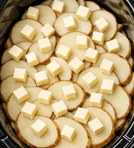 Toss raw sliced russet potatoes into the slow cooker with just 3 other ingredients and somehow you get a cozy dinner your family will ask for again.