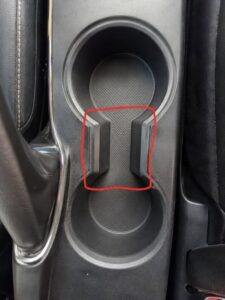 Most Drivers Never Realize What That Small Gap in a Cup Holder Is For