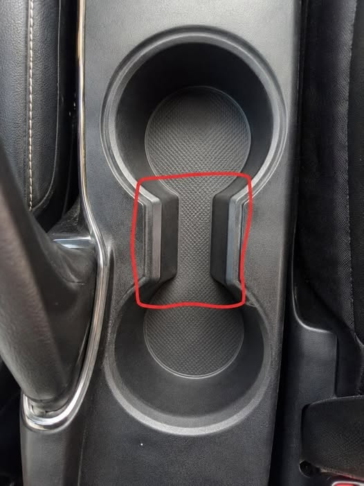 Most Drivers Never Realize What That Small Gap in a Cup Holder Is For