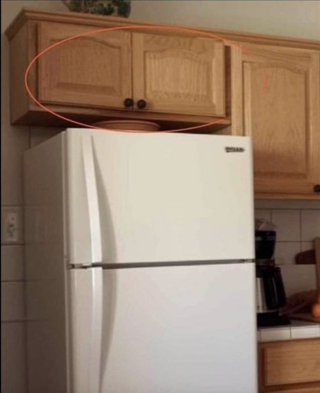 Here’s what the cupboards above your fridge are for