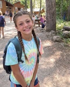My daughter went away to scout camp for a week, and I was so happy when she sent me a photo — but after I looked at it more closely, I frantically called the camp.