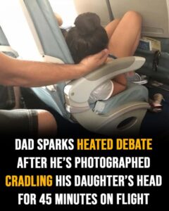 Dad sparks debate holding daughter’s head 45 mins while she slept on flight