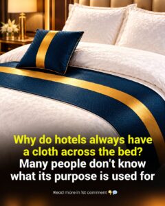 Why Do Hotels Place a Narrow Strip of Fabric Across the Bed? Here’s What It’s Really For